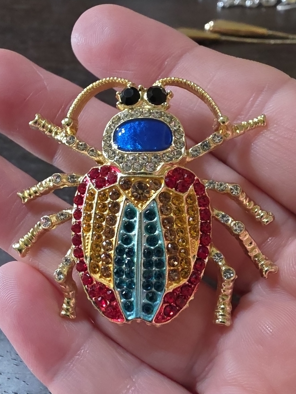 A141- Gold-Tone Multicolor Beetle Brooch with Red, Blue & Yellow Crystals